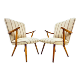 Une paire de chaises vintage avec des rayures