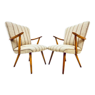 Une paire de chaises vintage avec des rayures
