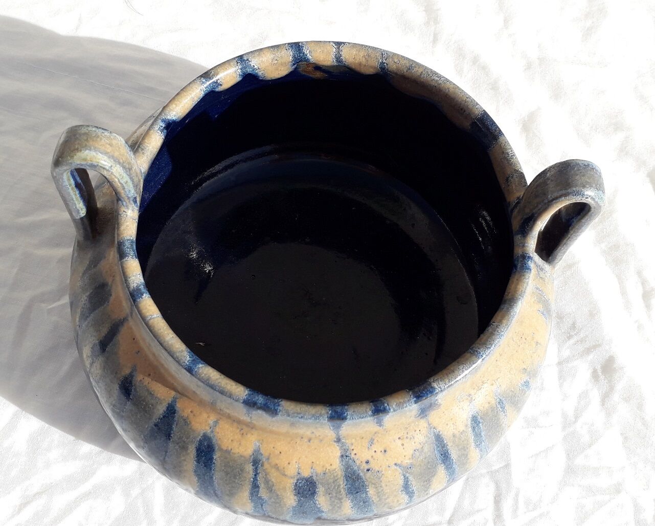 Signed stoneware pot cover