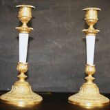 Pair of bronze and white opaline candlesticks