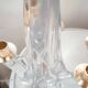 Pair of vintage Schneider crystal and brass candlesticks