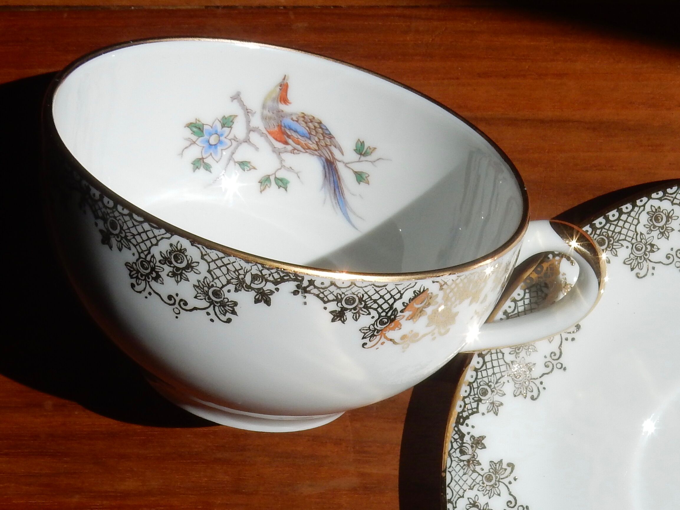 Charles Ahrenfeldt's teacup and subcup limoges