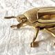 Vintage golden brass scarab