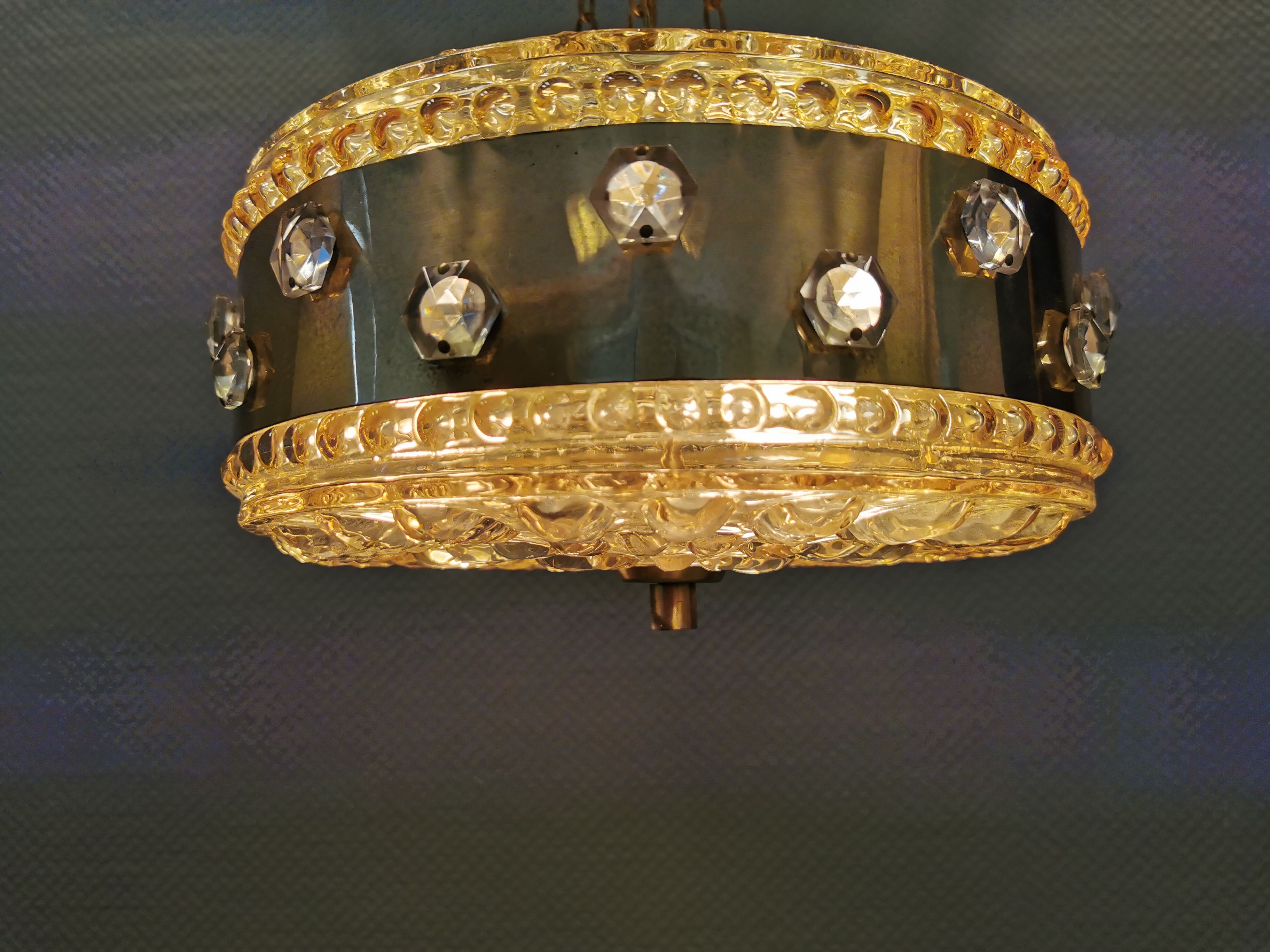 Ceiling-hanging lamp in glass with prisms and metal details
