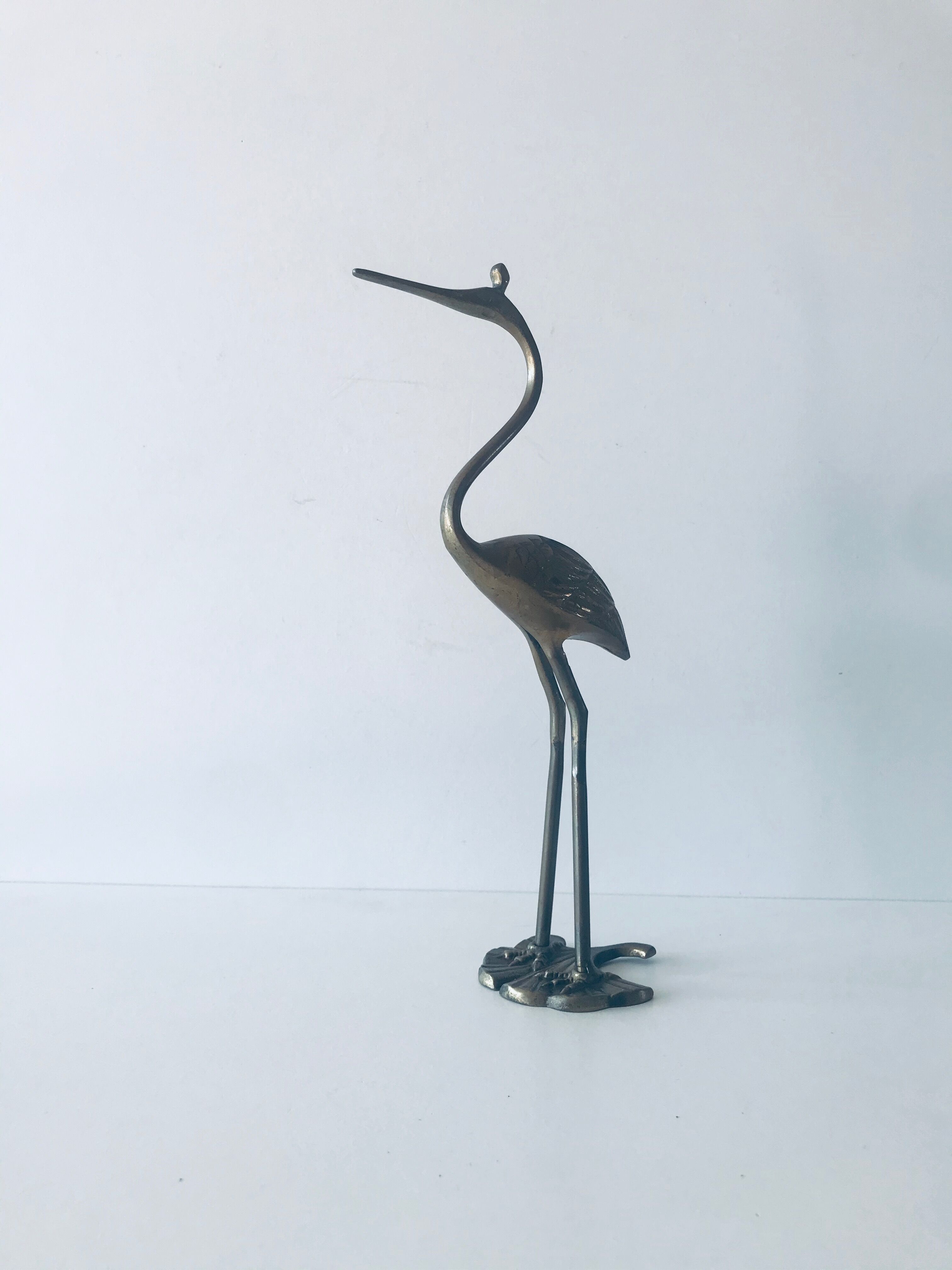 Heron, brass bird