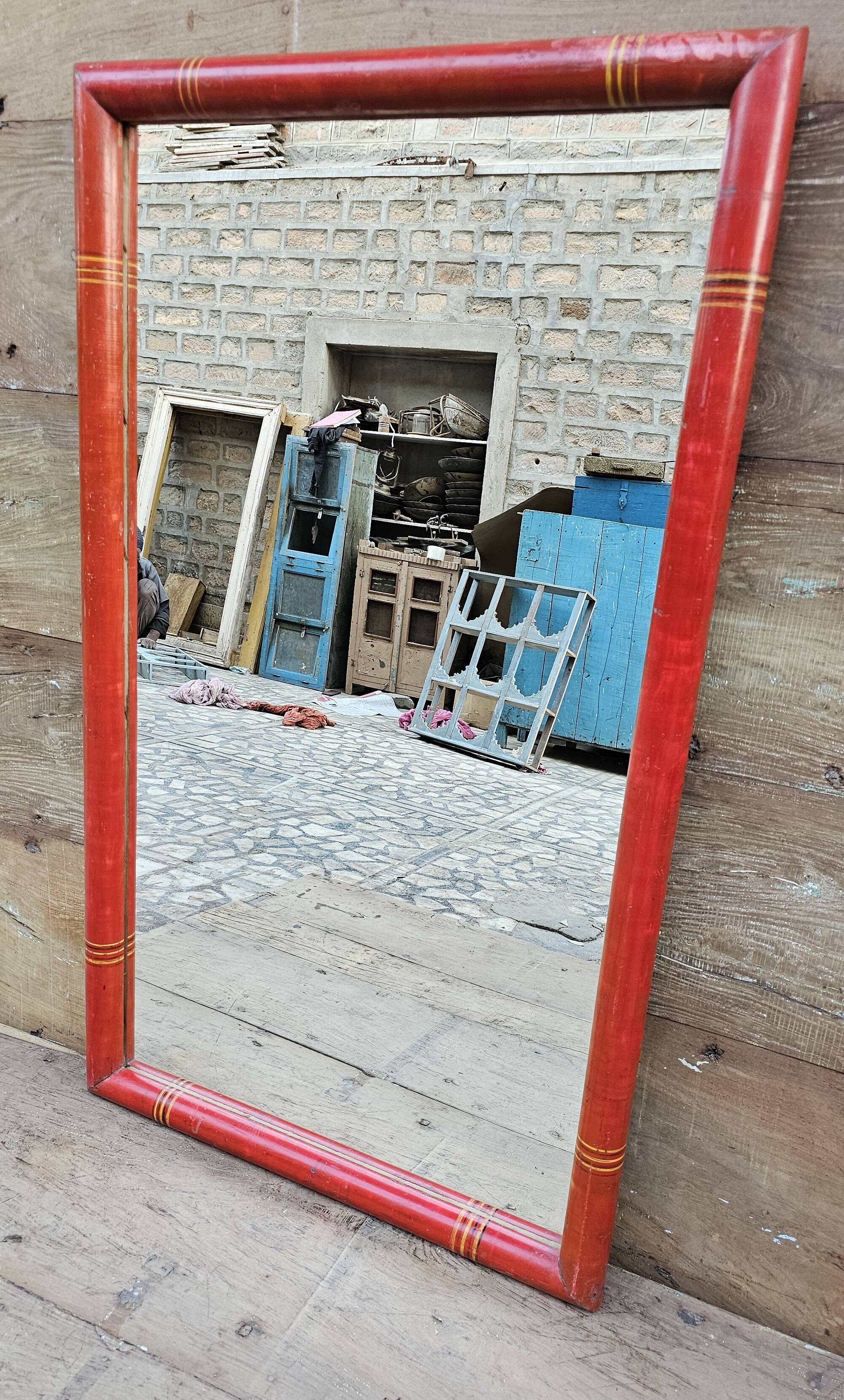 Antique mirror in Burmese teak.