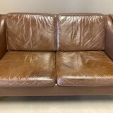 Scandinavian design 2-seater leather sofa.