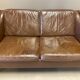 Scandinavian design 2-seater leather sofa.