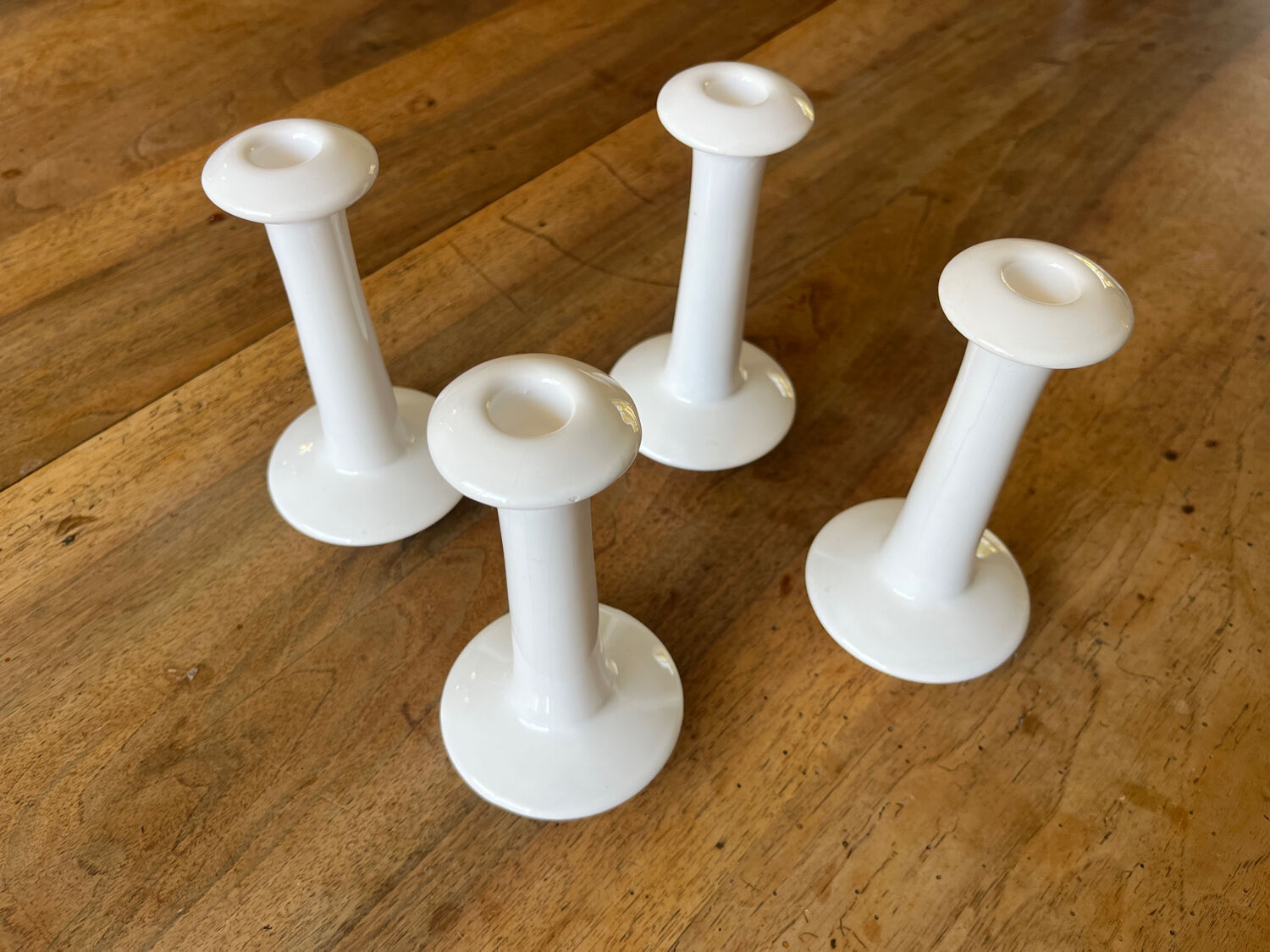 Set of 4 white ceramic candle holders