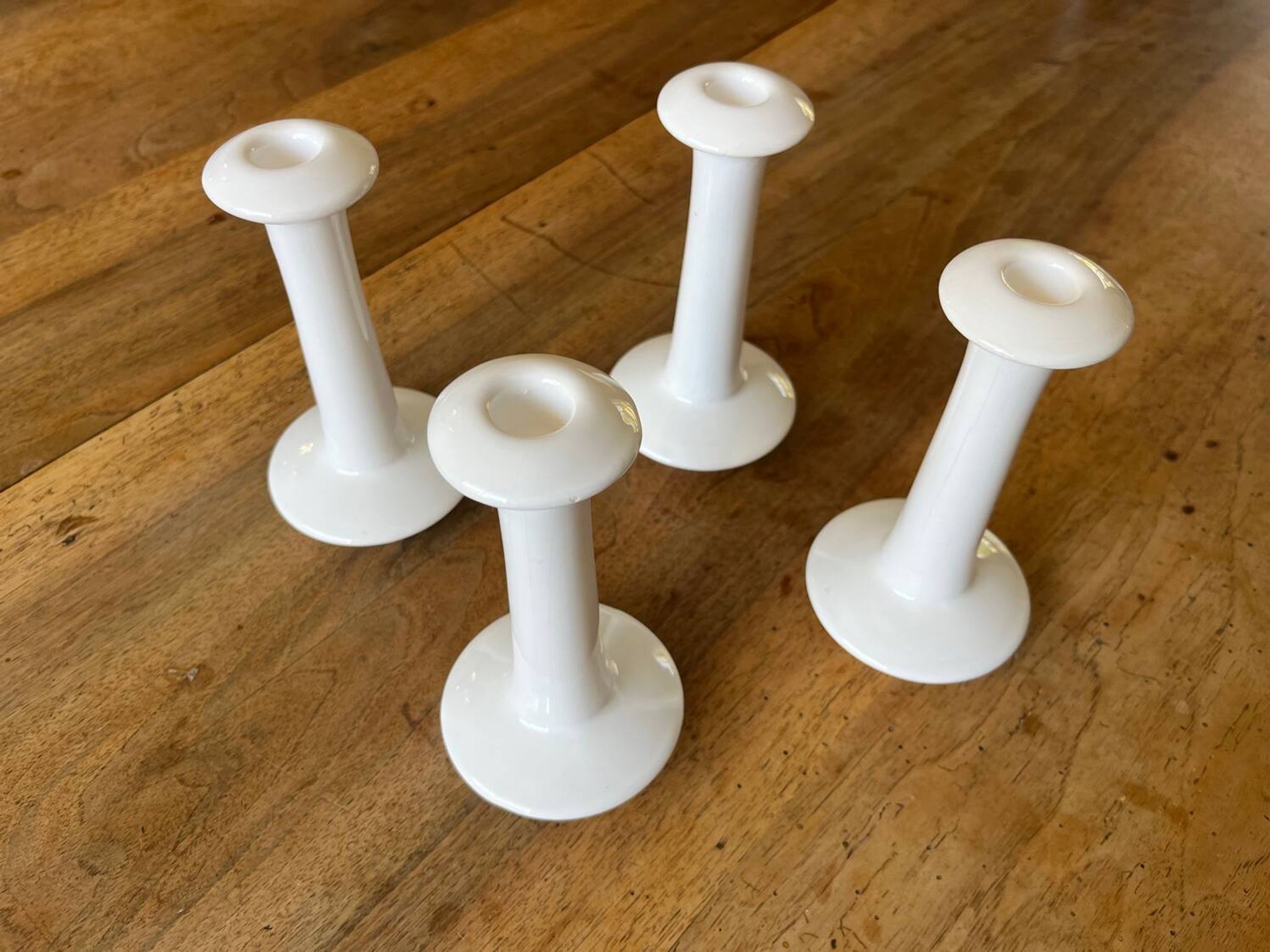 Set of 4 white ceramic candle holders