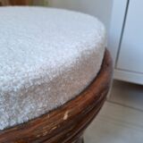 Rattan and boucle fabric pouf
