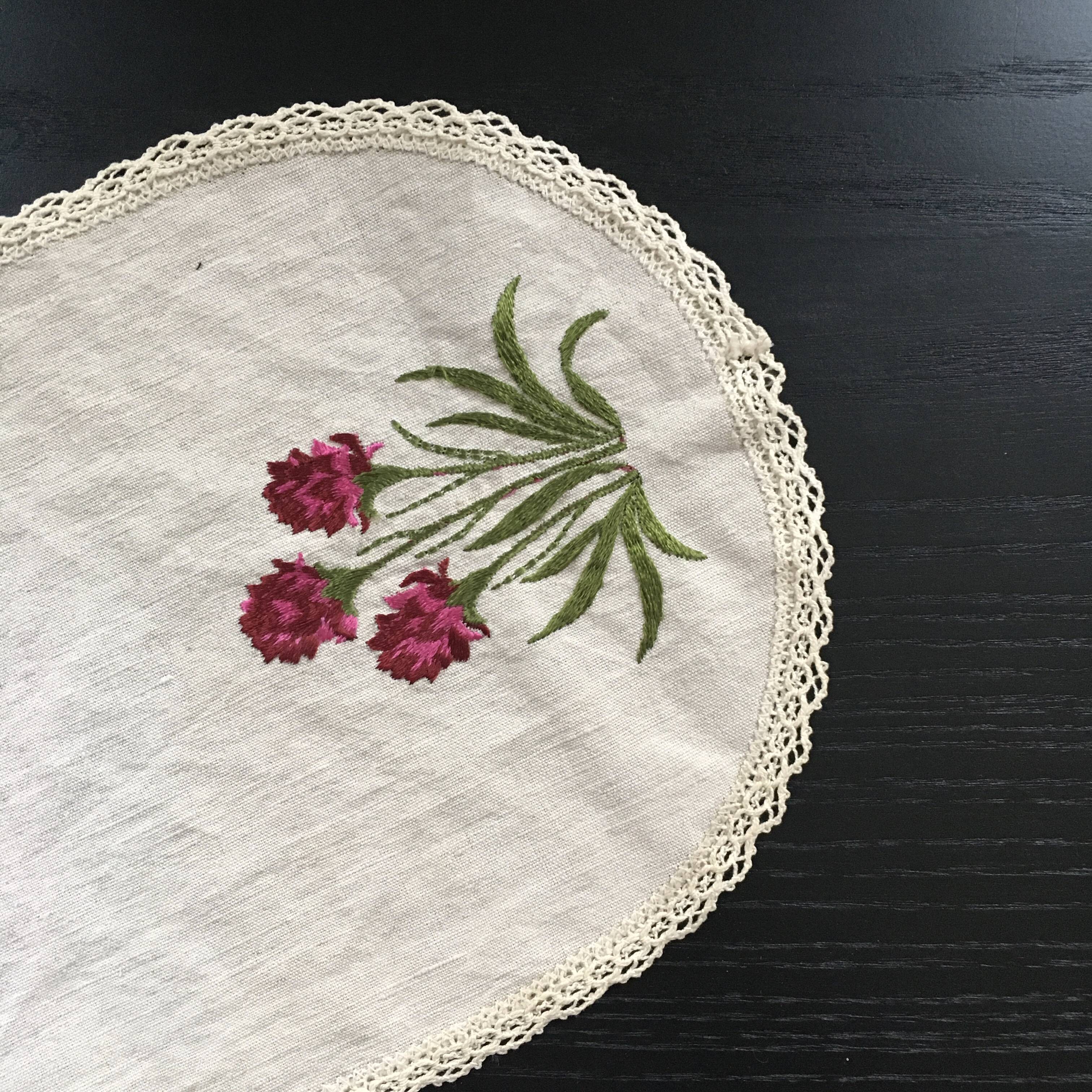 Embroidered red flower doily