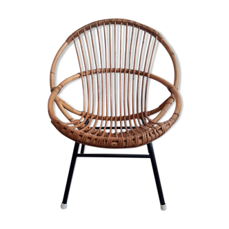Vintage rattan and black metal shell chair from the 1960s