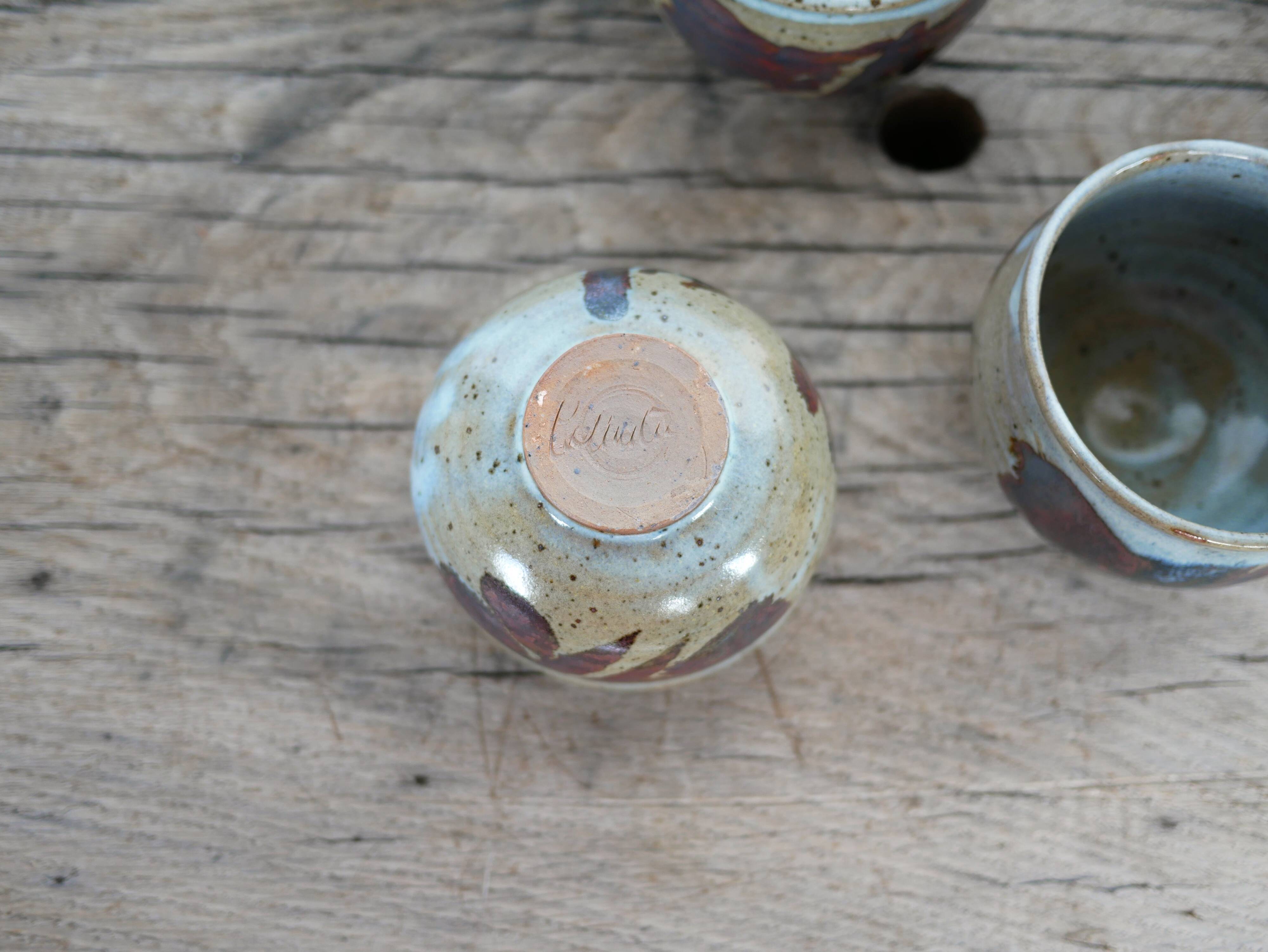 Series of 5 vintage stoneware cups