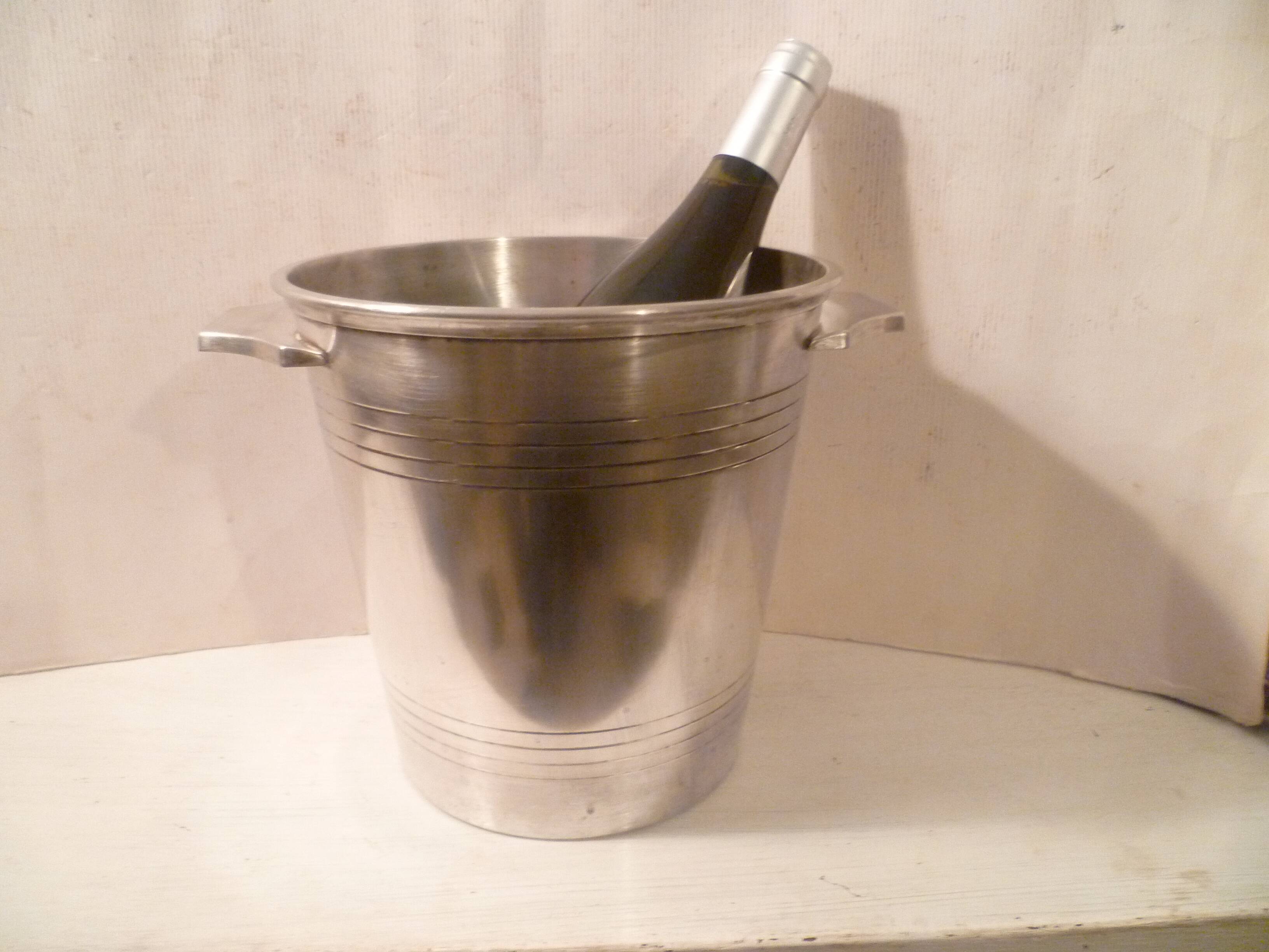Champagne bucket / Champagne bucket design in silver-plated metal, St Medard.