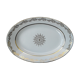 Plat ovale en porcelaine .signé LJ & cie