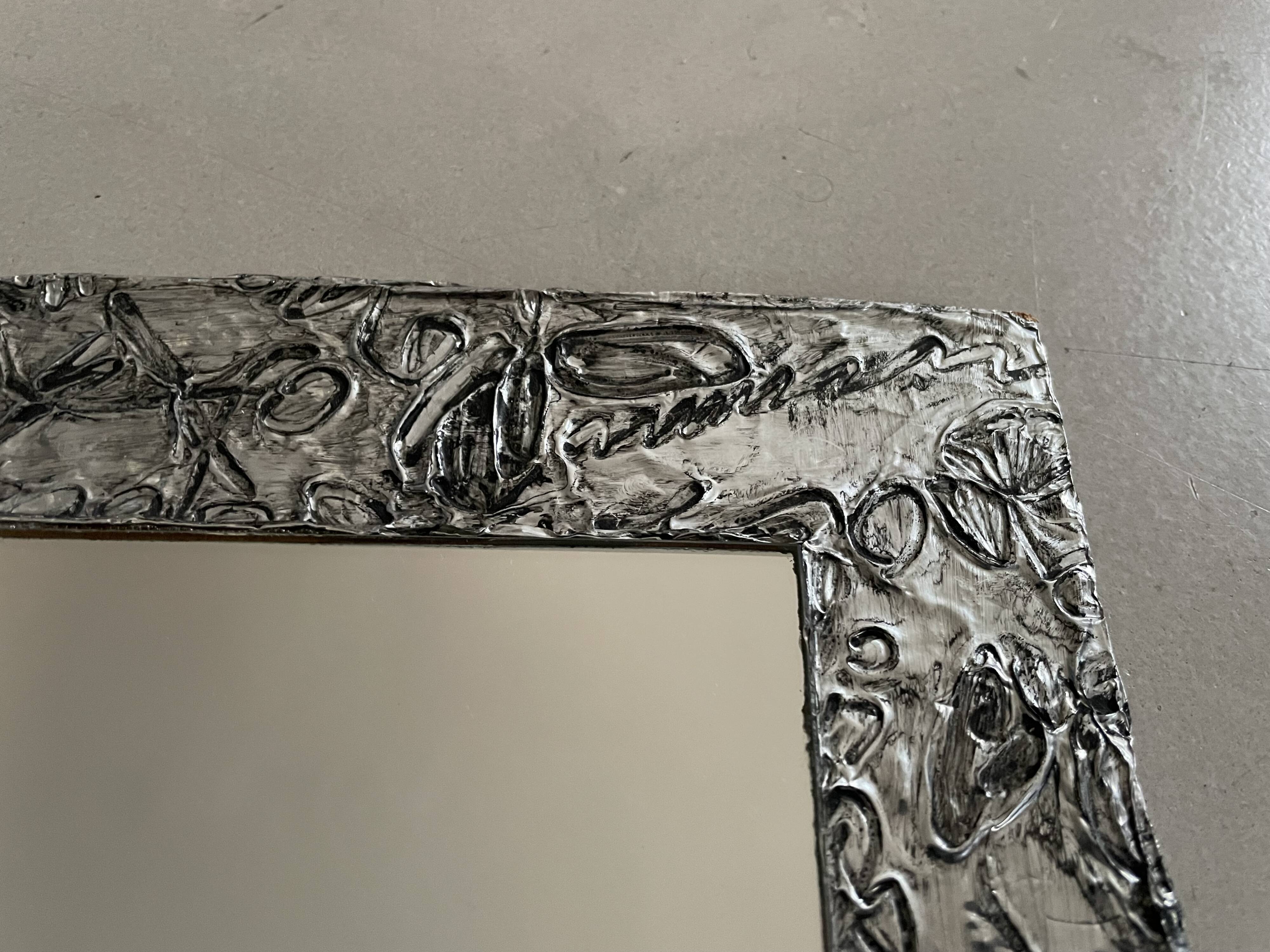 Vintage stamped mirror