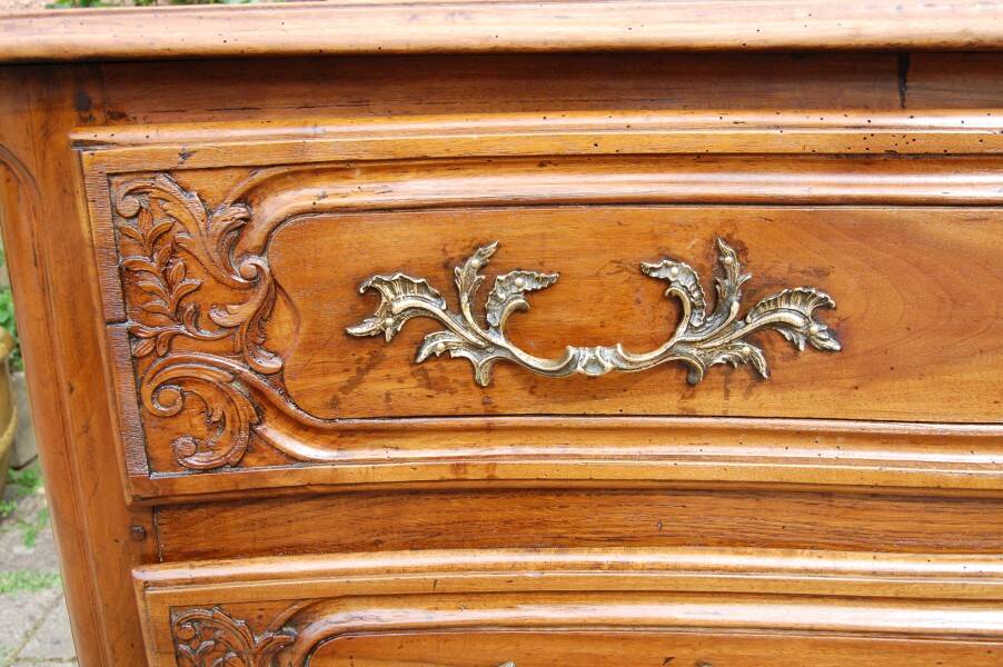 18th-century Louis XV walnut commode.