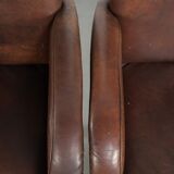 Set of 4 nicely finished dining chairs/side chairs with armrests made of cowhide leather