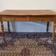 Cherry wood desk with a leather top.