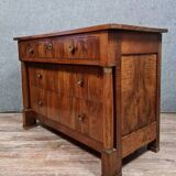 Empire period chest of drawers in walnut and gilded bronze circa 1810-1820
