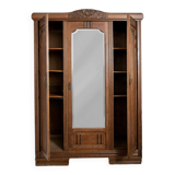 Old solid wood wardrobe with three vintage mirror doors