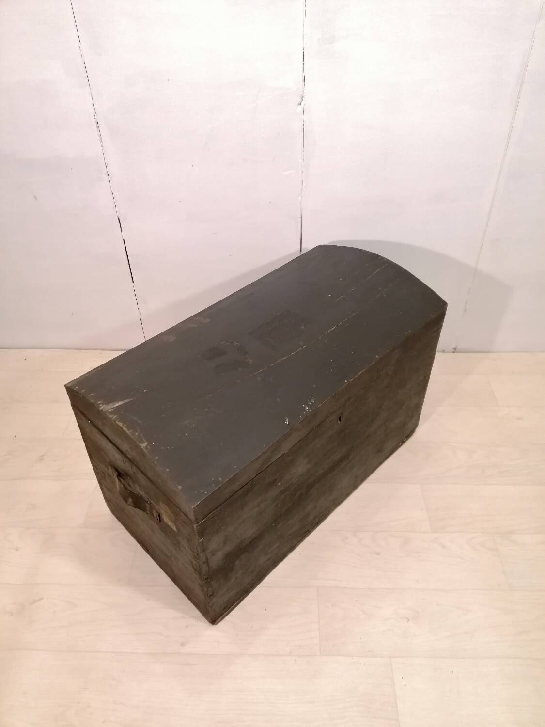 Large travel trunk in blackened wood