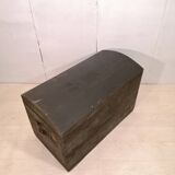 Large travel trunk in blackened wood