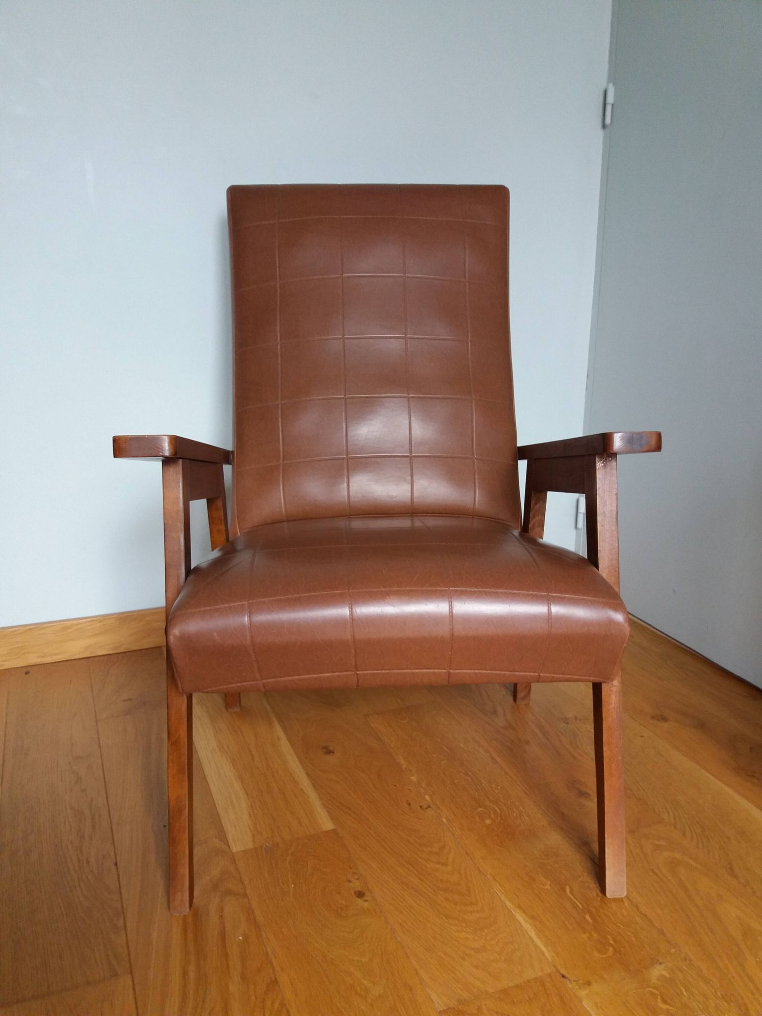 Scandinavian armchair in brown leatherette and wood