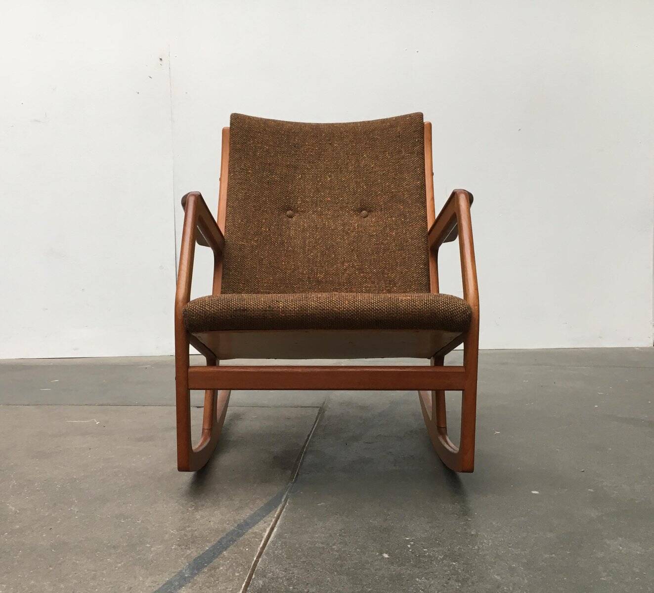 Mid-century model 100 rocking chair in Danish teak by Søren Georg Jensen for Kubus Møbler, 1960s.