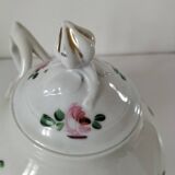 Porcelain teapot with rose patterns