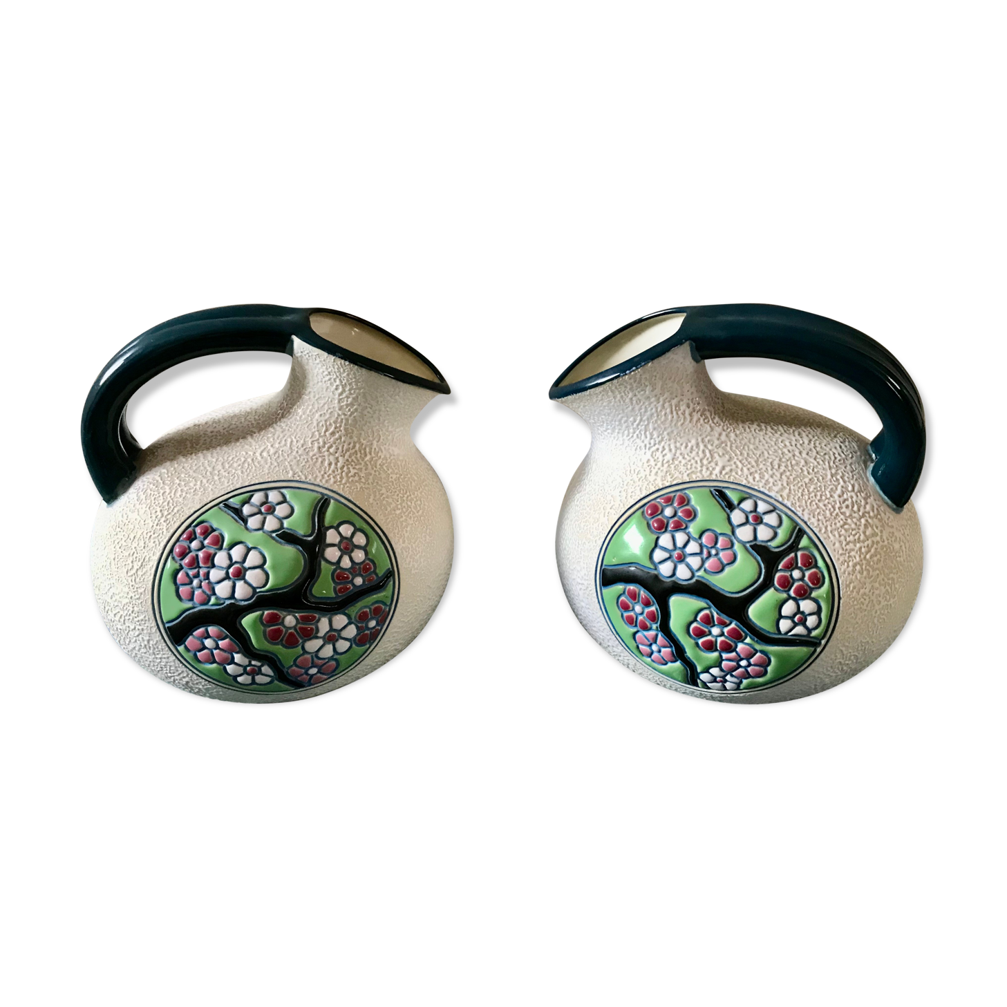 Pair of art deco pitchers