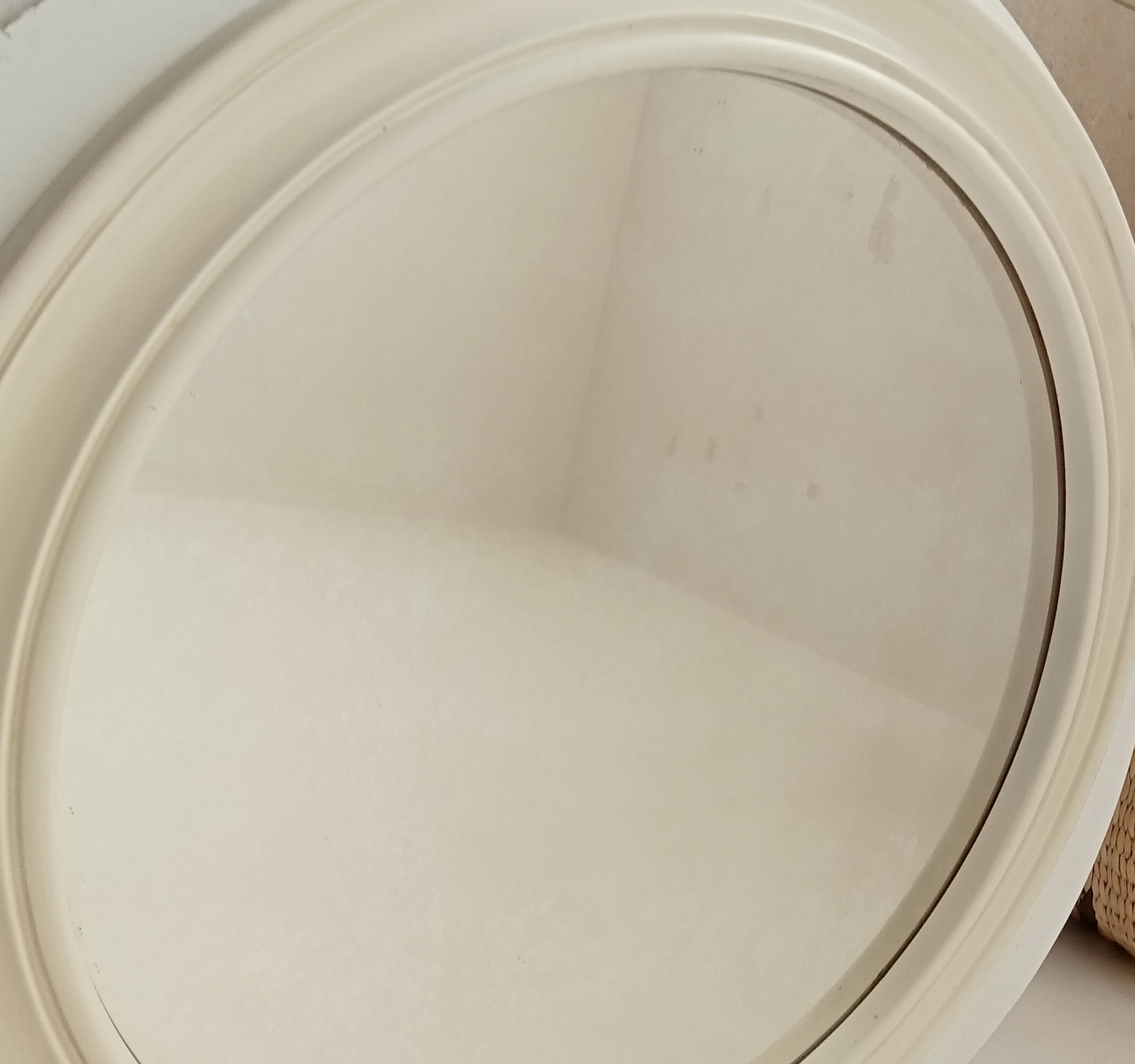 Vintage round resin mirror from the 60s/70s