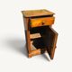 Small rustic antique bedside table made of solid wood.