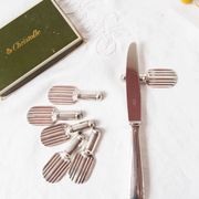 Set of 6 Christofle knife rests in the Strié model in silver-plated metal.