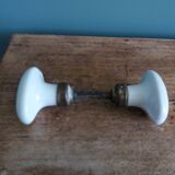 White porcelain door knob handles