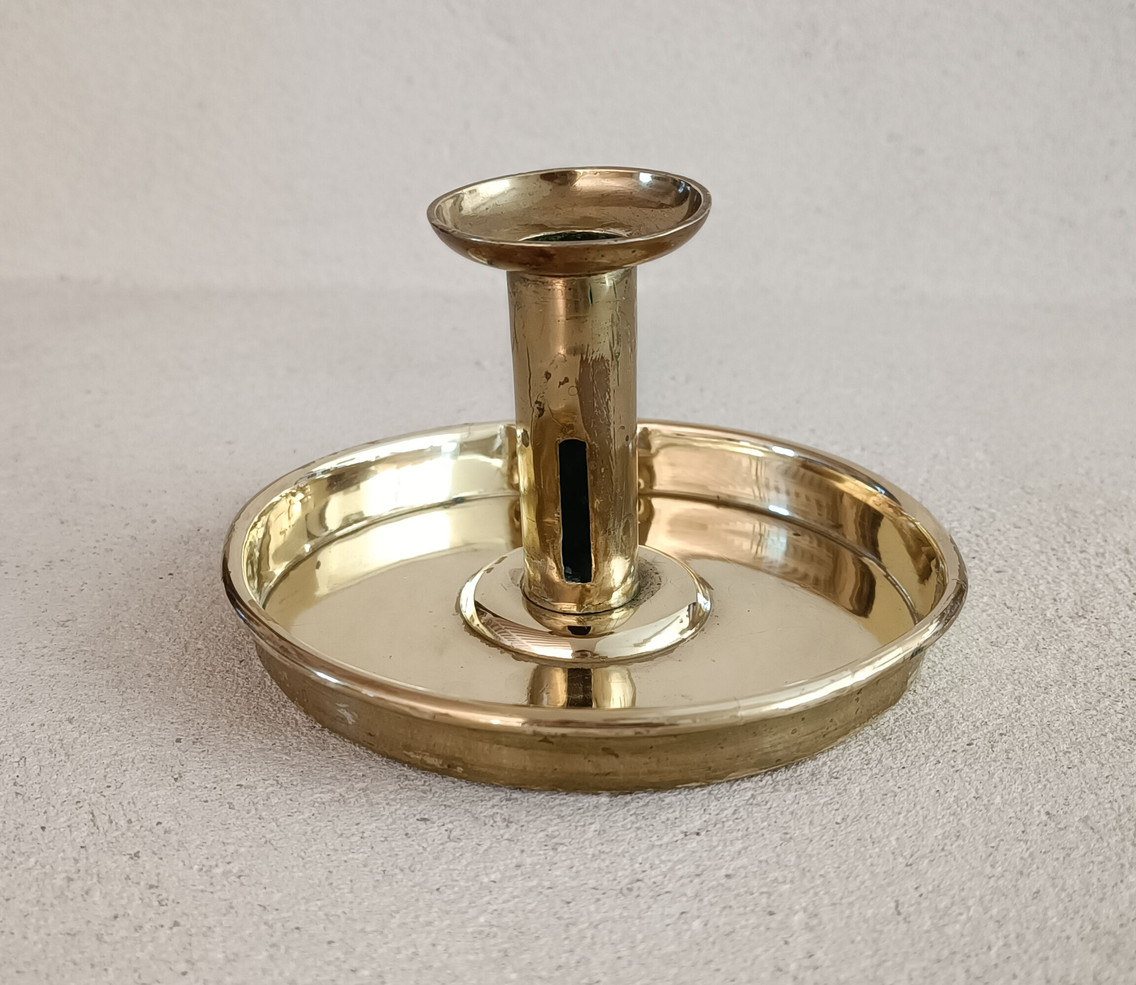 Yellow copper hand candle holder