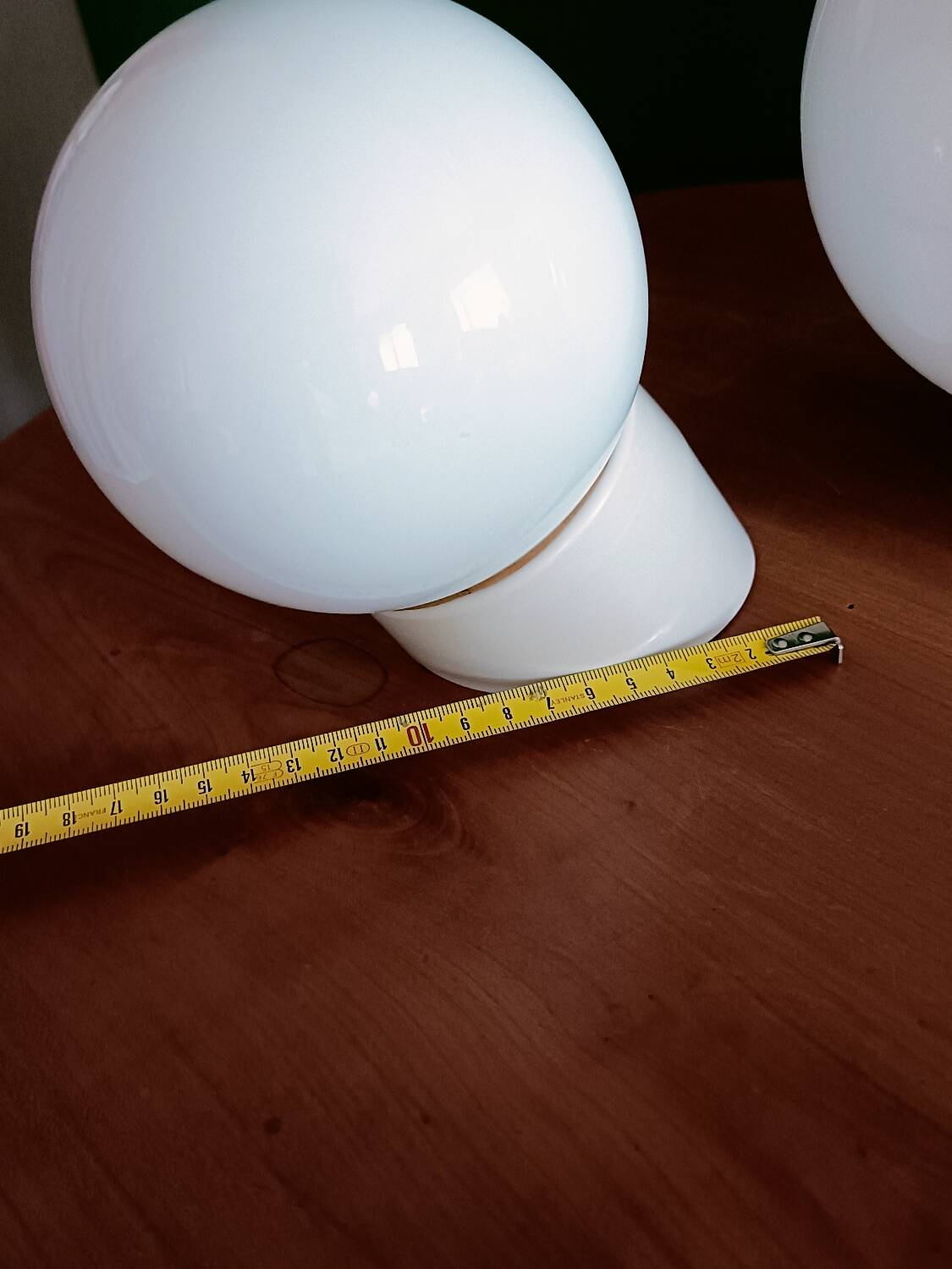 Two opaline glass globe wall lights