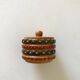 Vintage small round box with lid in light wood carved in relief decorated painted