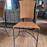 Glass and metal table and its 4 wicker chairs and glass Roche Bobois