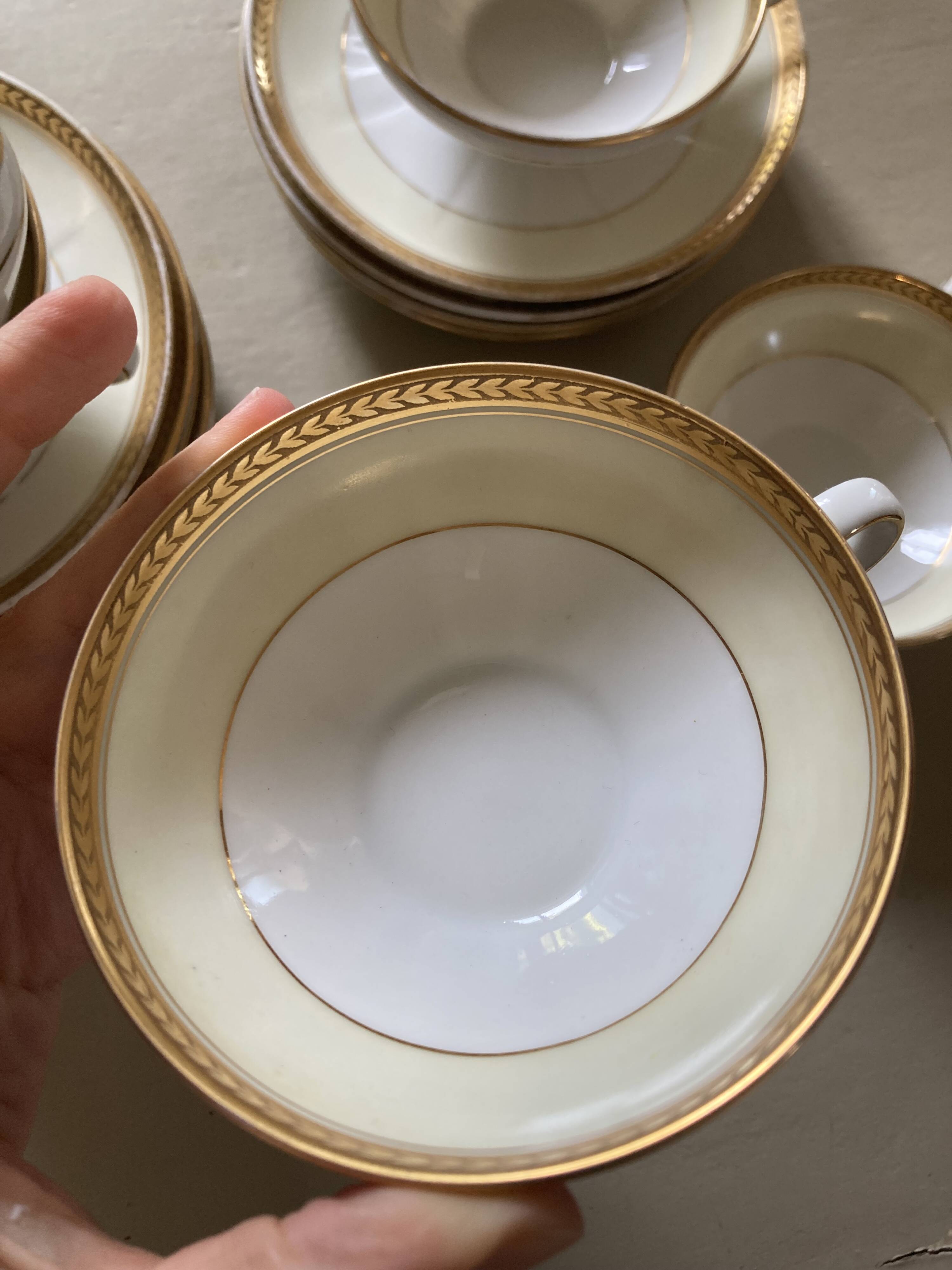 Vintage Limoges porcelain chocolate teacups in pastel yellow and gold