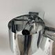 Pair of vintage wall lights, curved chrome metal, France 1970