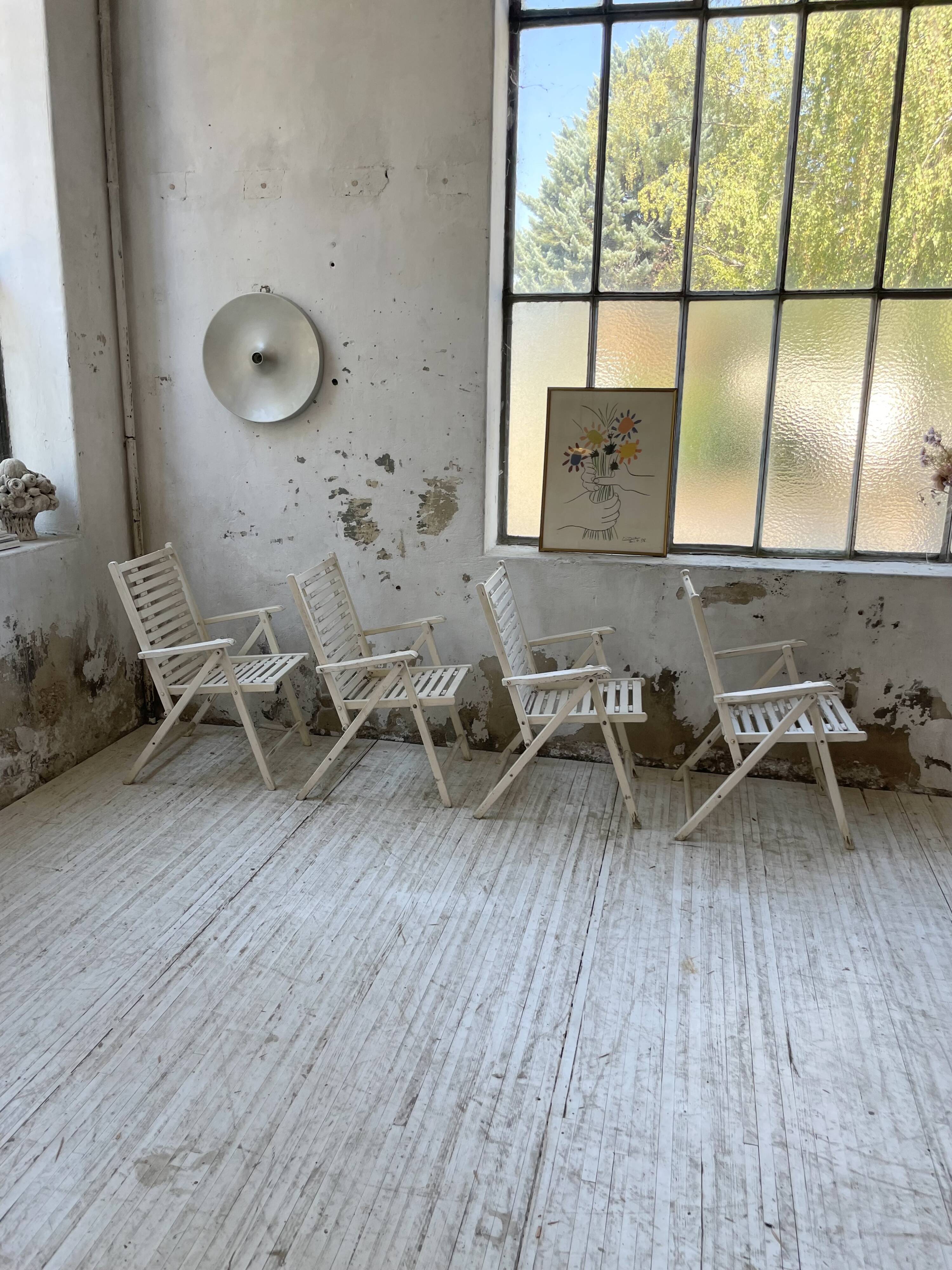 4 white wooden garden chairs