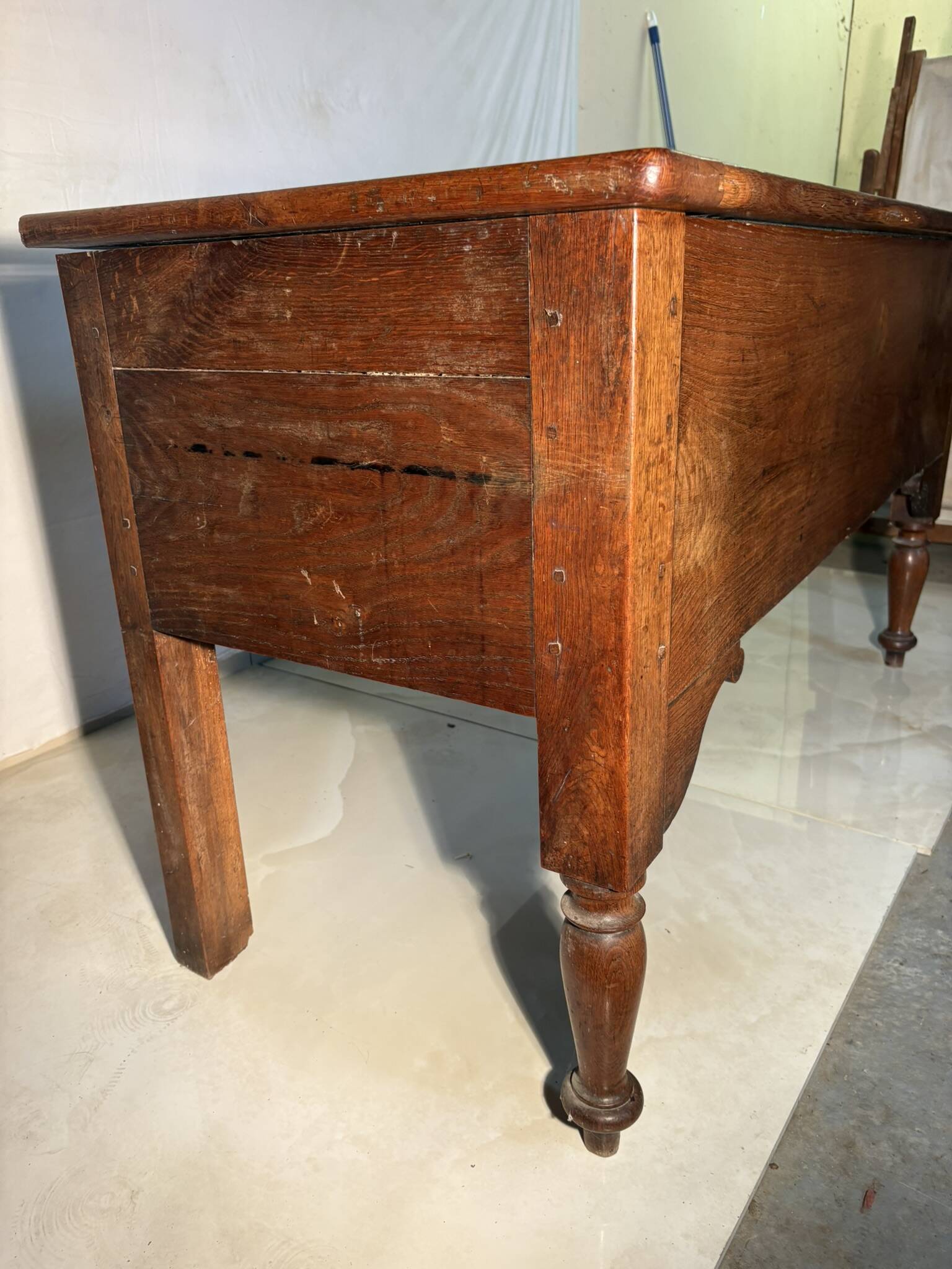 Large antique oak chest with turned legs