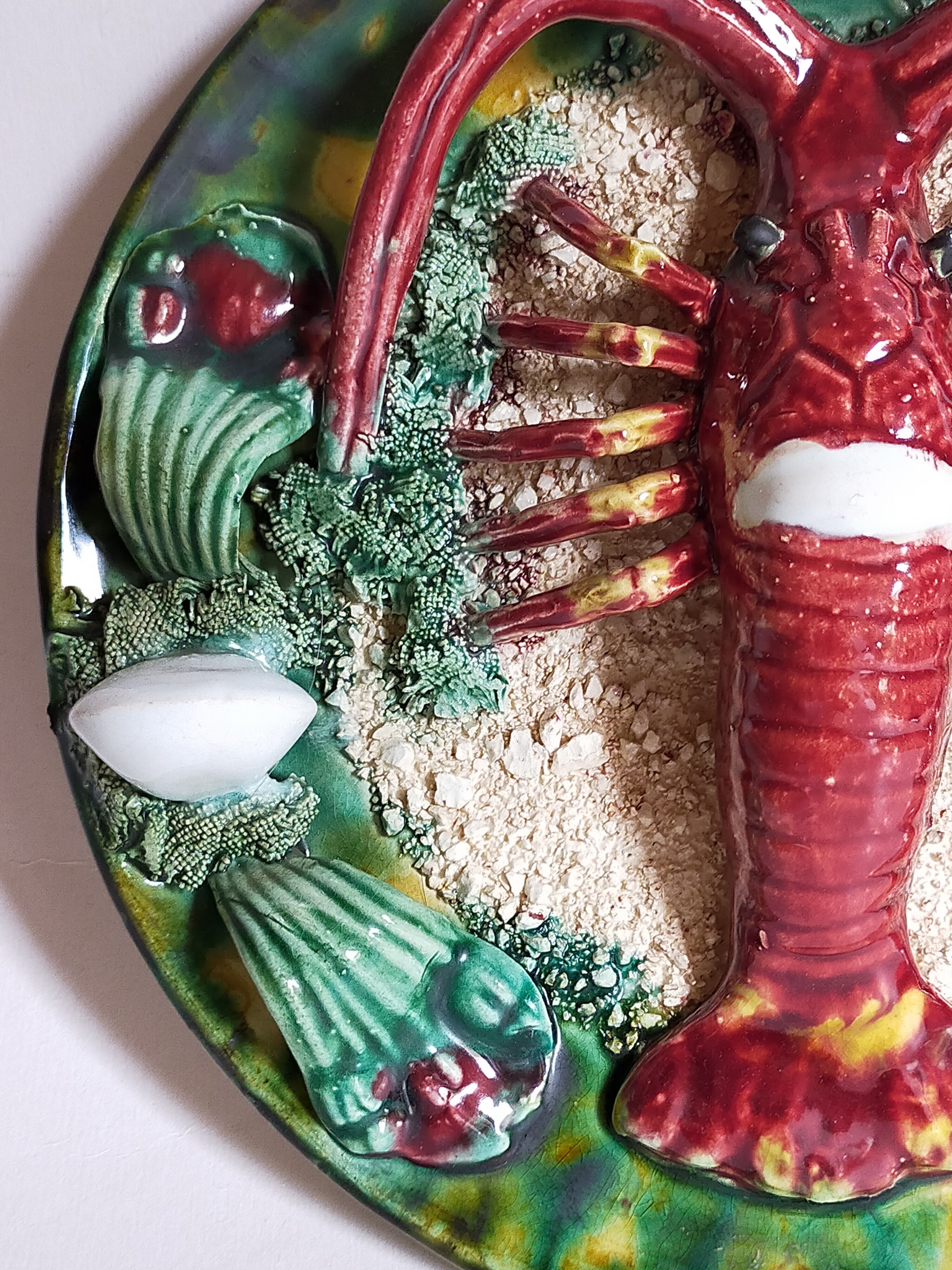 Plate in old barbotine with lobster