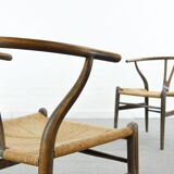 Pair of CH24 wishbone dining chairs by Hans Wegner for Carl Hansen Denmark