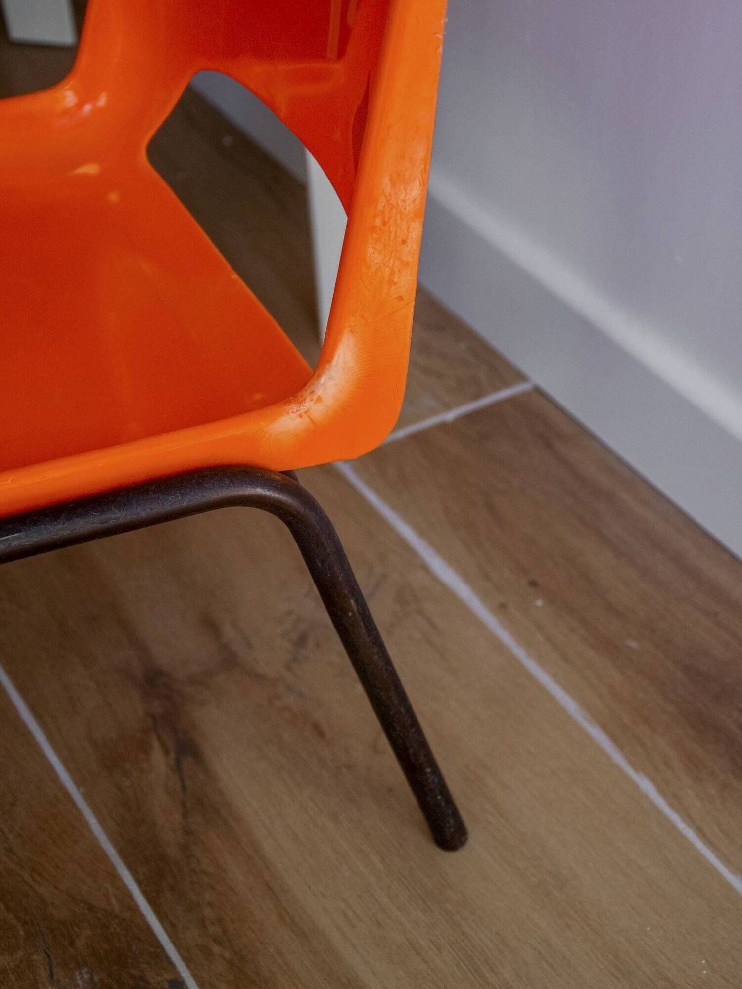 Vintage orange children's chair from the seventies.