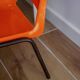 Vintage orange children's chair from the seventies.