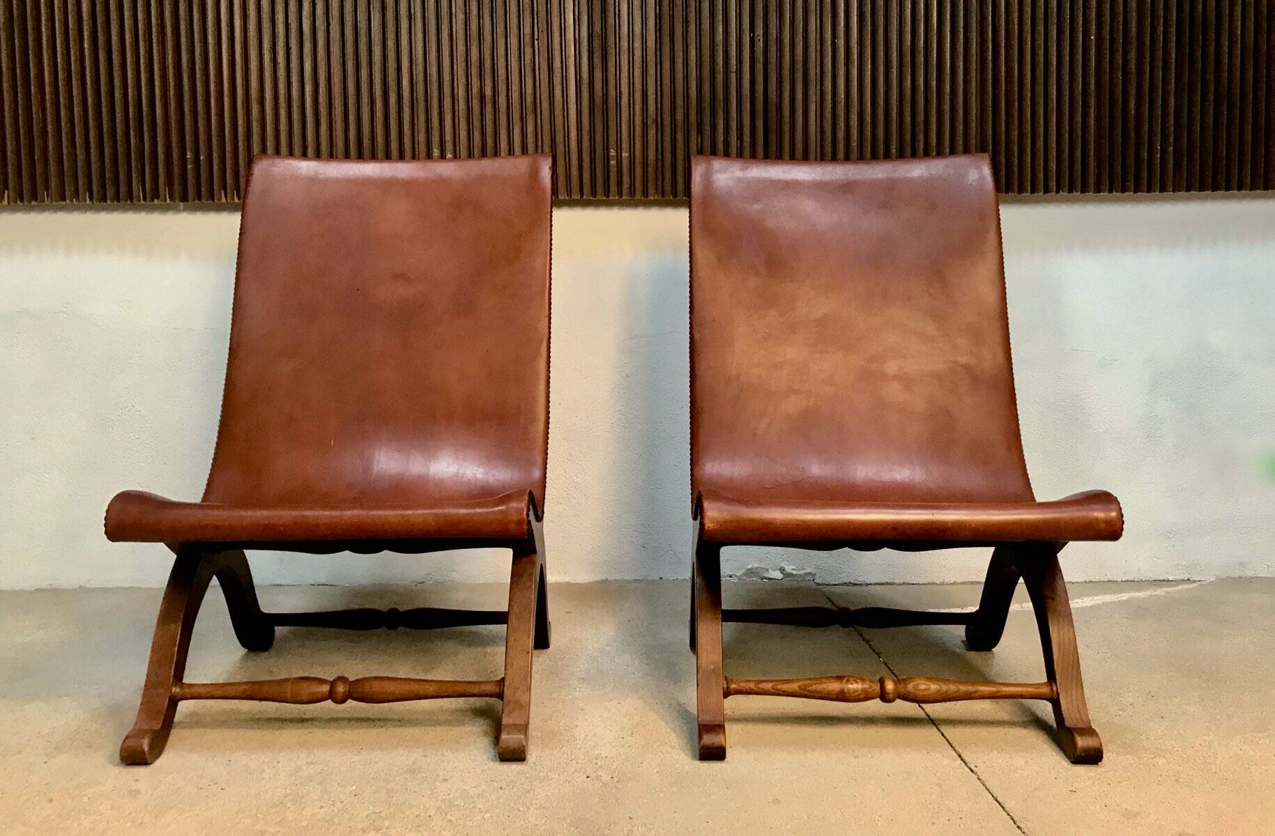 Set of 2 Spanish high-back leather slipper chairs by Pierre Lottier, 1950s