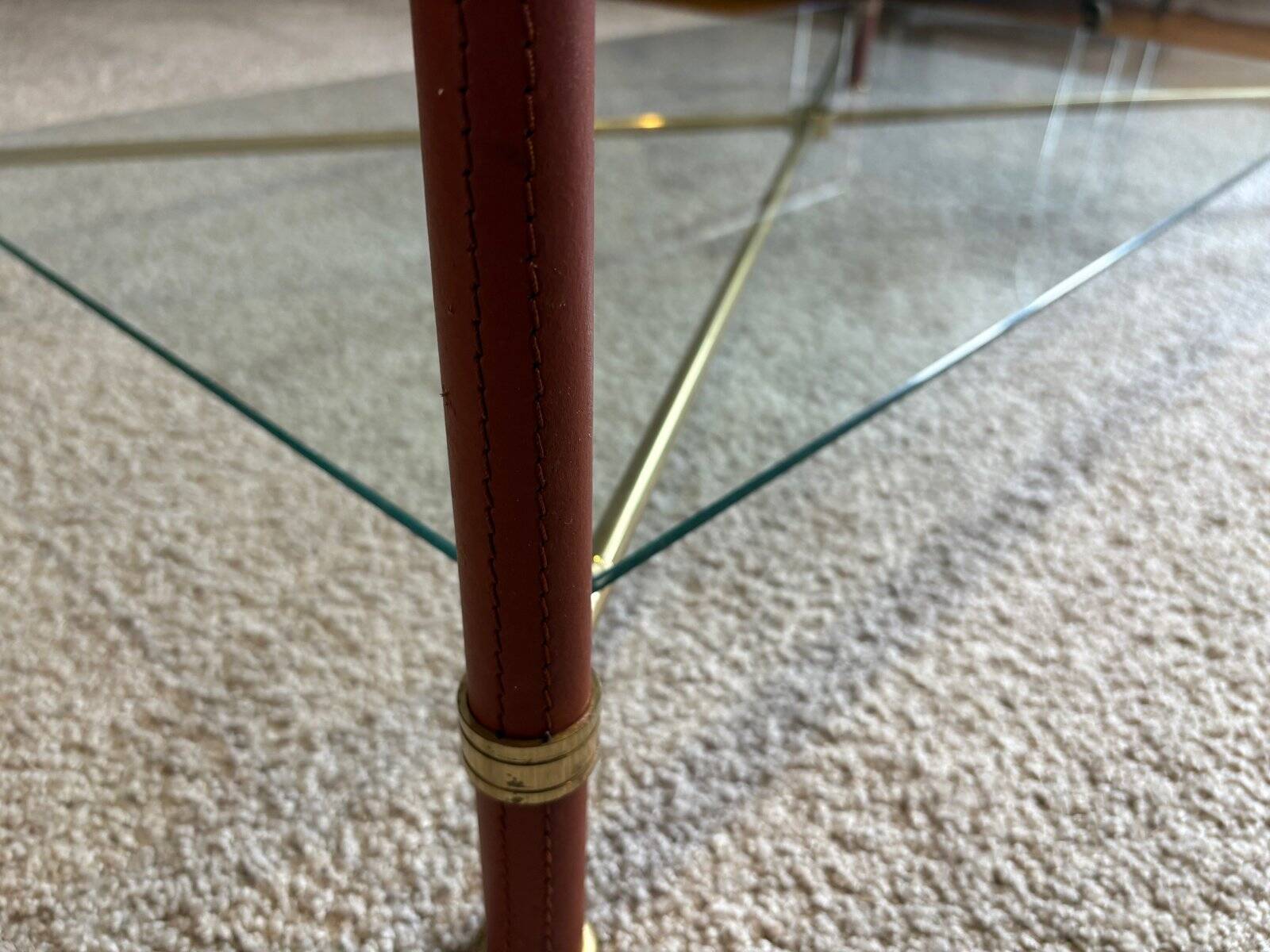 Coffee table in the style of Jacques Adnet, France, 1960s